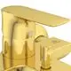 Armatur in Goldoptik mit Hebel und einem Auslauf, beschriftet mit Ideal Standard. Der Wasserhahn ist für eine moderne Badgestaltung geeignet.